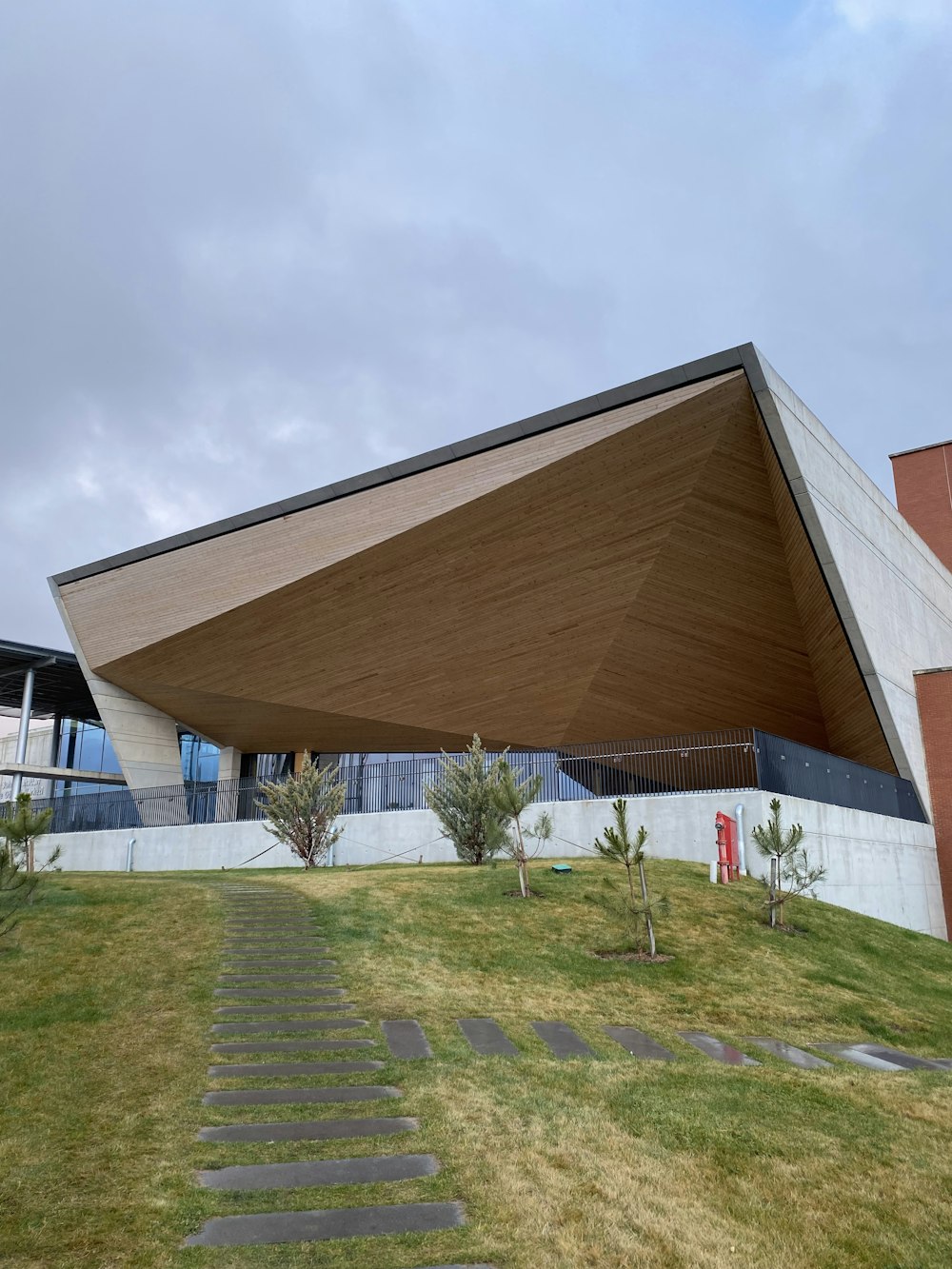 a large building with a sloping roof on top of it