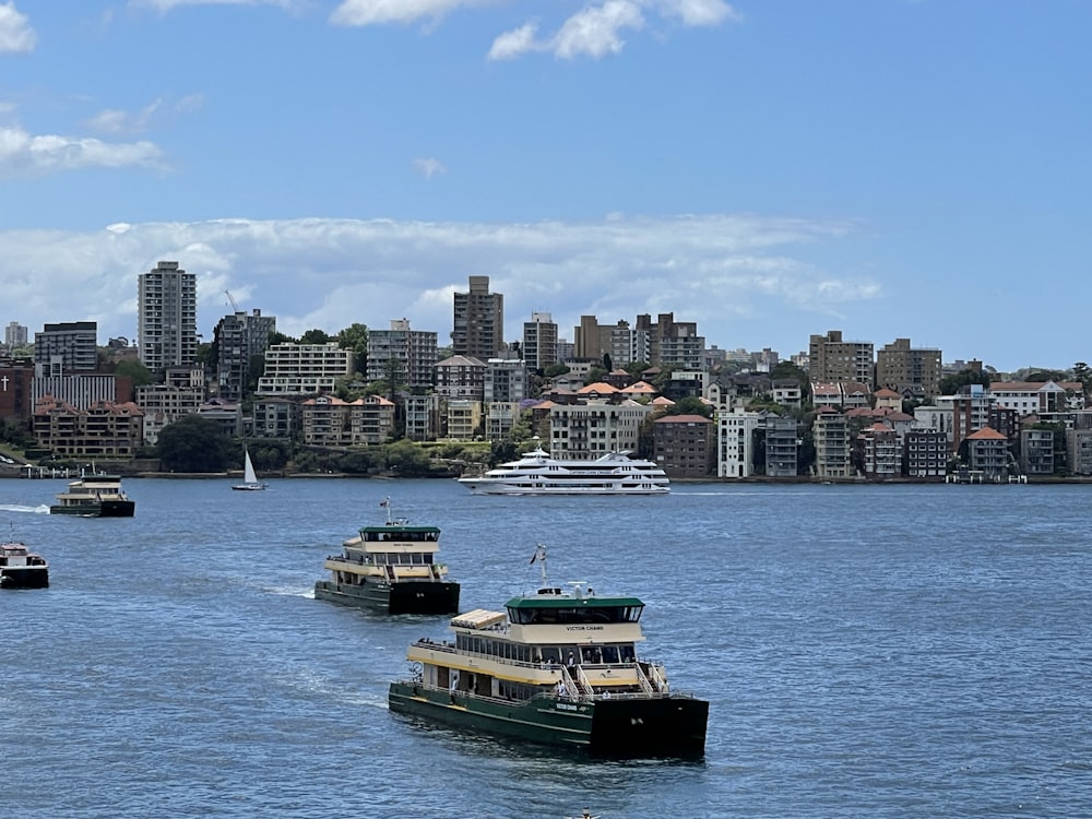 a number of boats in a large body of water