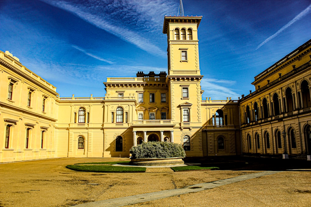 a large building with a clock tower in the middle of it