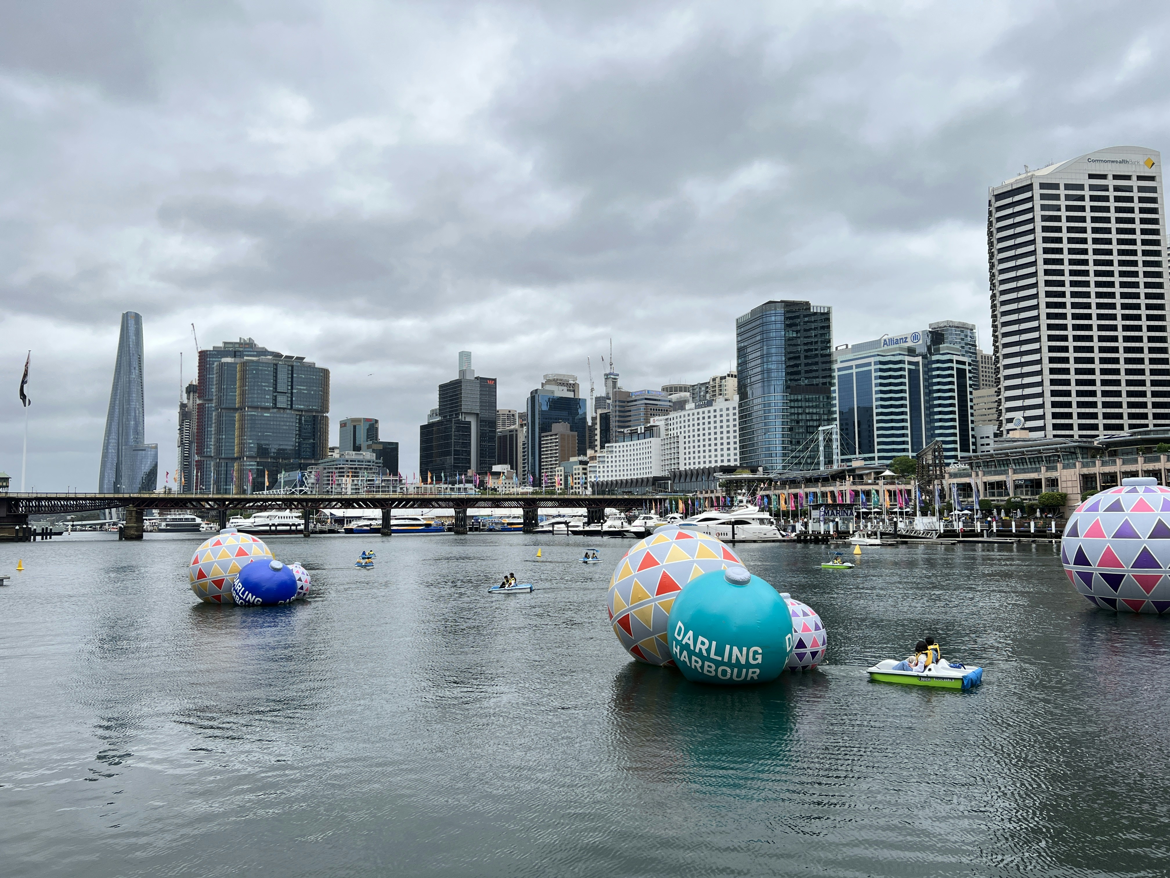 a body of water filled with lots of colorful floats