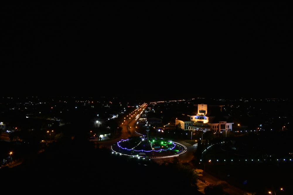 an aerial view of a city at night