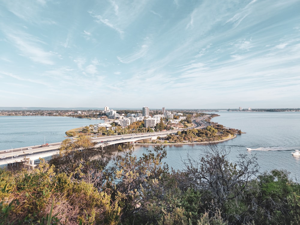 a view of a city and a bridge over a river