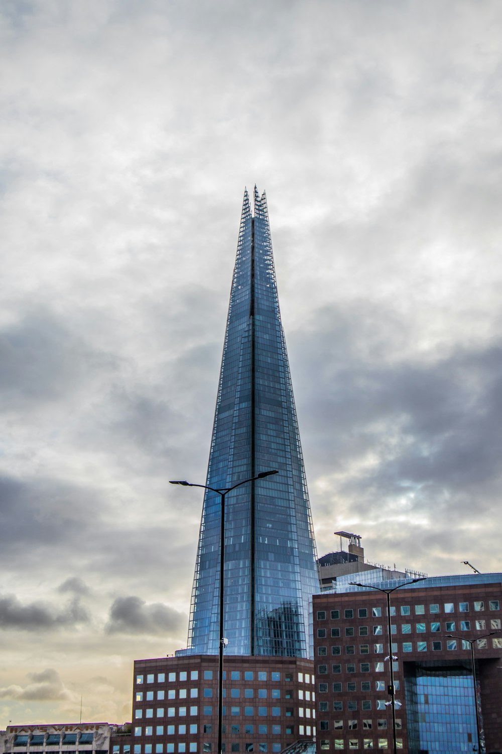 a very tall building towering over a city