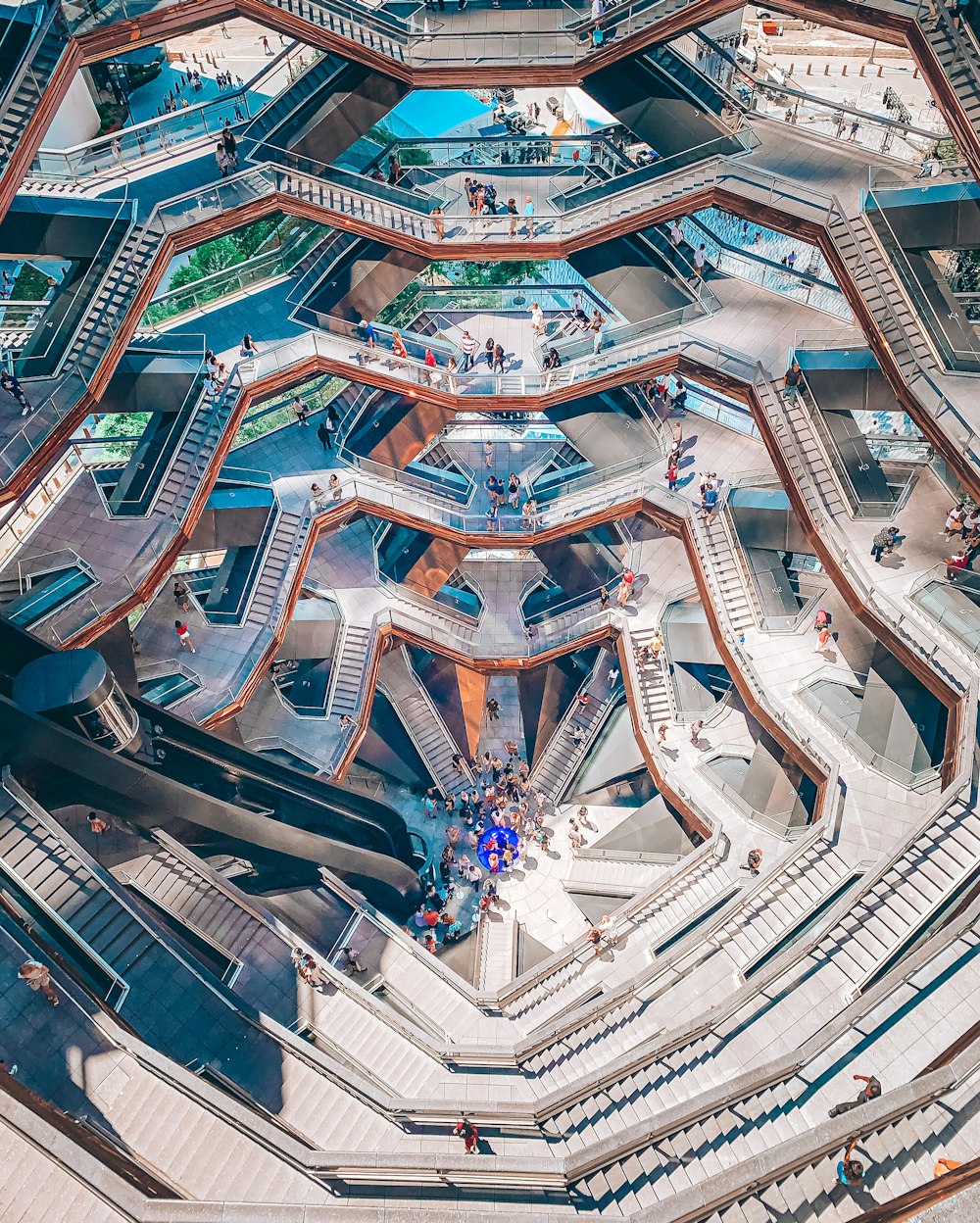 an aerial view of a building with stairs and escalators