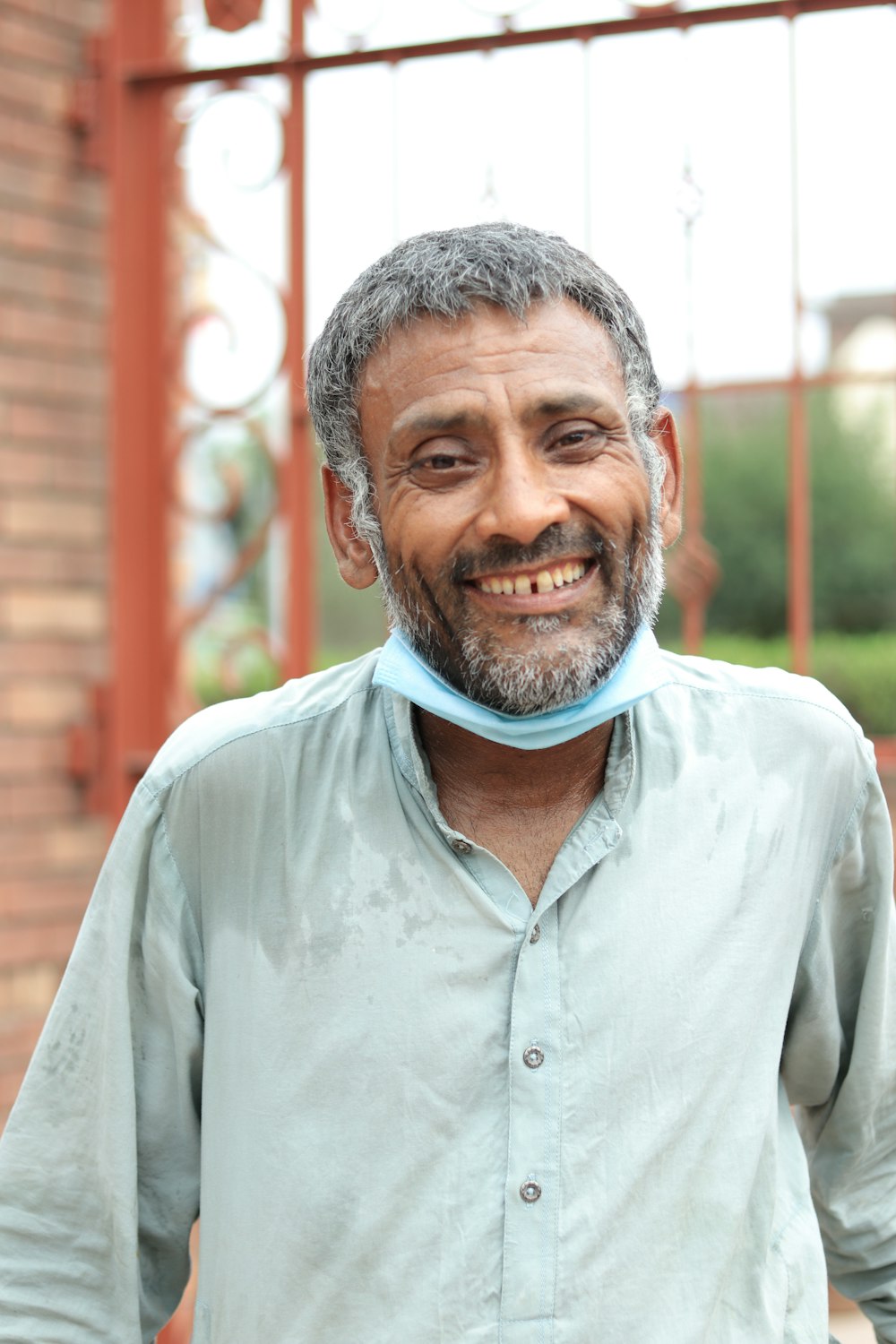 a man with a tie around his neck