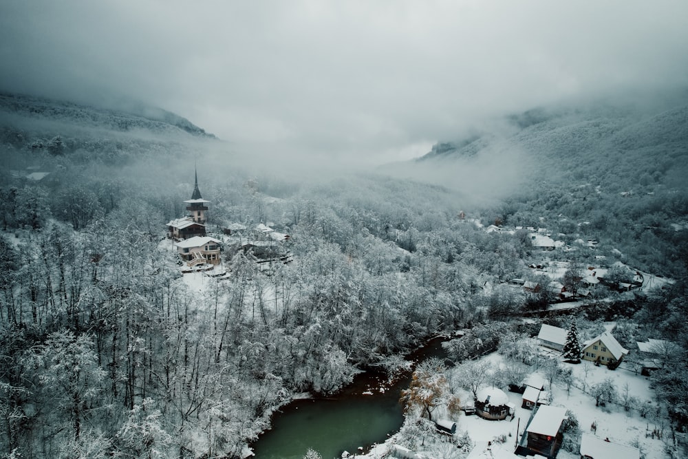 an aerial view of a village in the mountains