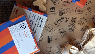 a paper bag with a book on top of it