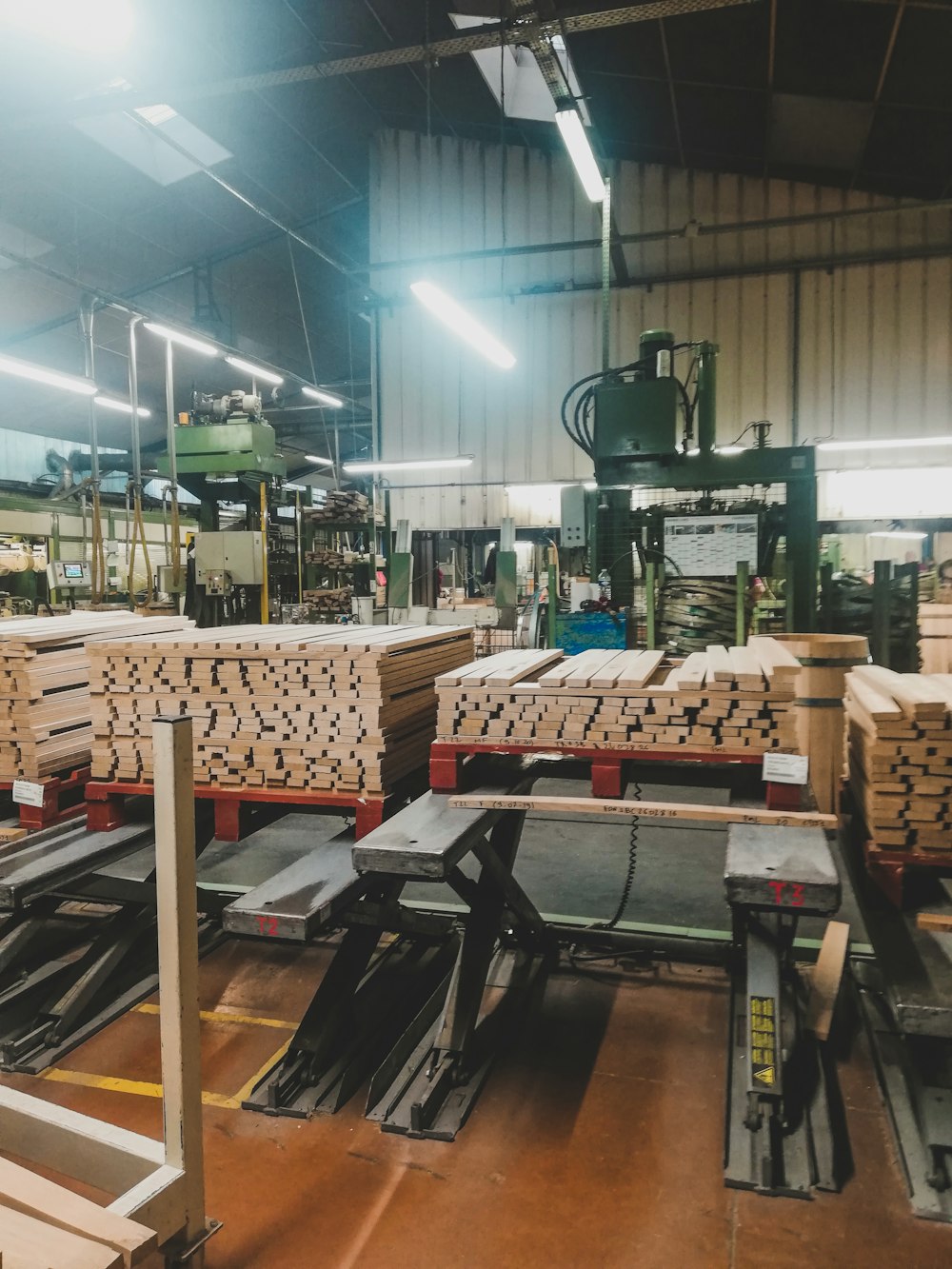 a warehouse filled with lots of wooden boxes