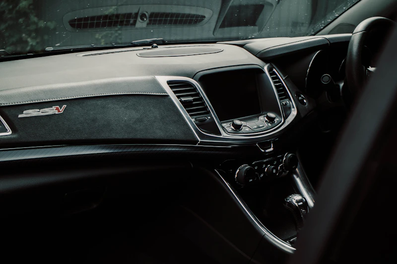 Clean, detailed dashboard and center console after interior detailing