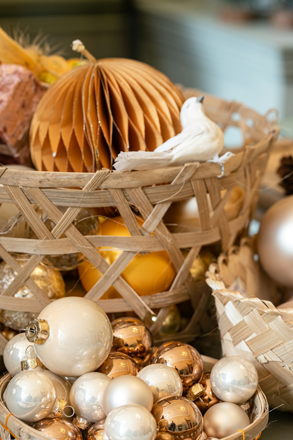 a basket filled with ornaments on top of a table