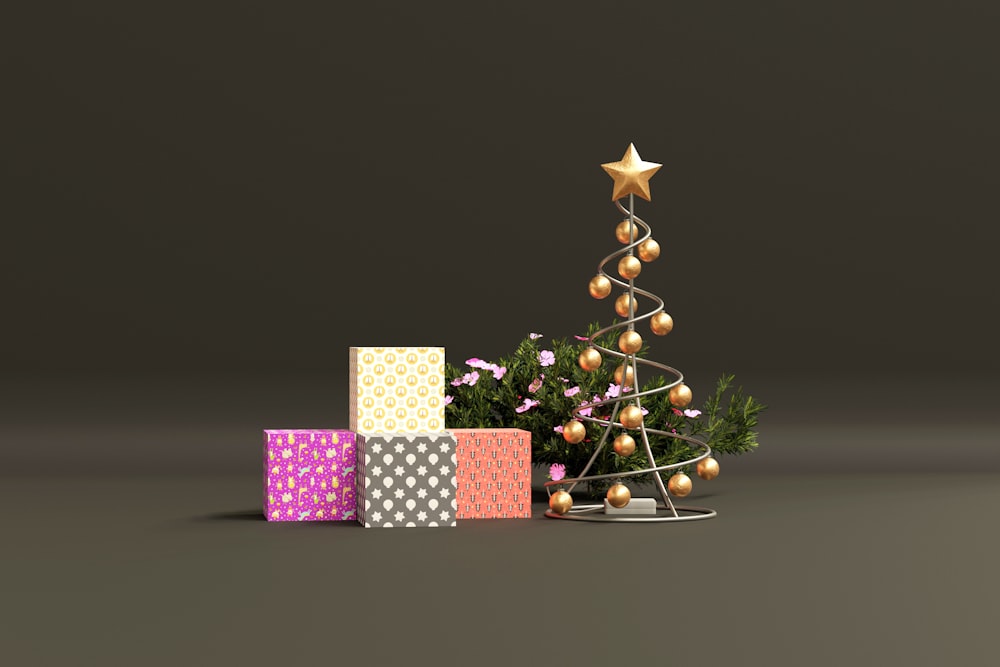 Ein kleiner Weihnachtsbaum umgeben von Geschenken