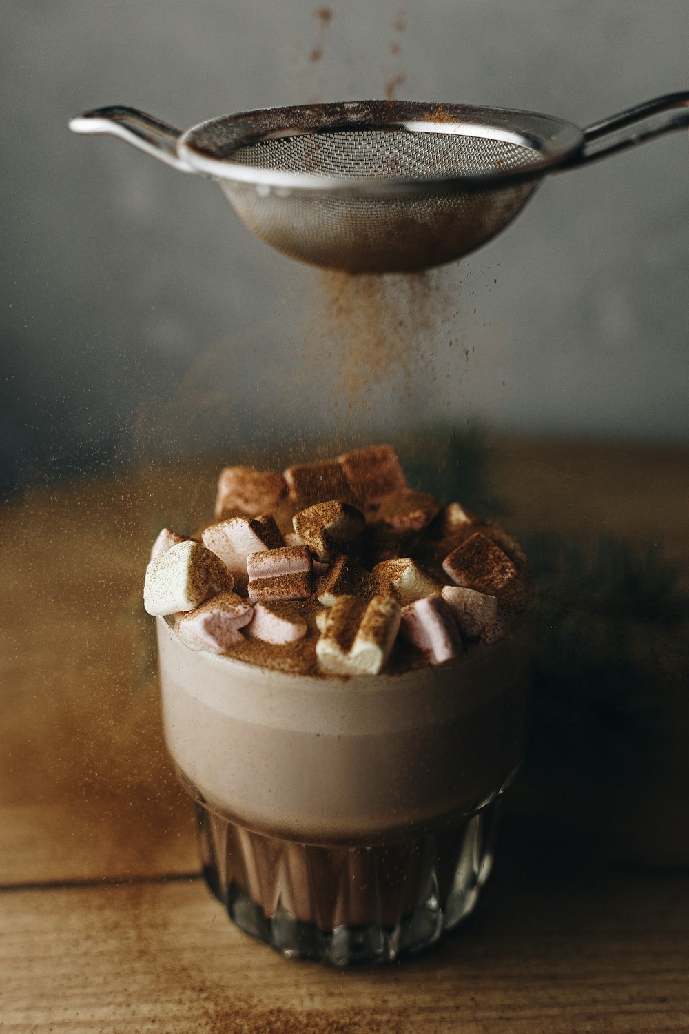 a cup of hot chocolate with marshmallows on top