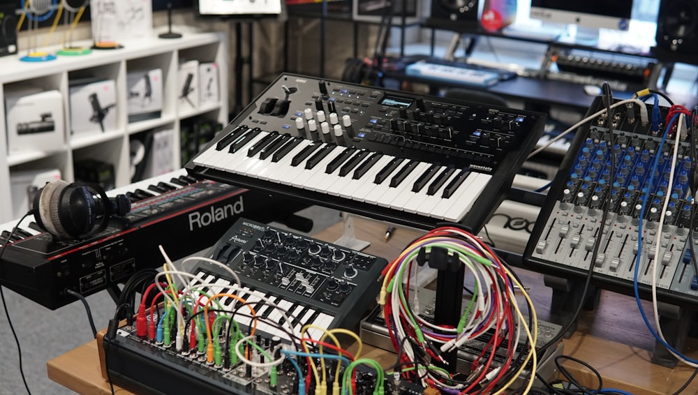 a bunch of electronic equipment sitting on top of a table