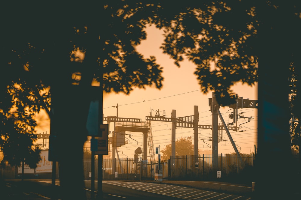 a train on a train track with power lines in the background