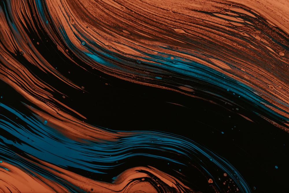a close up of a black and orange background