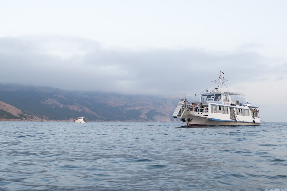 a large boat floating on top of a large body of water