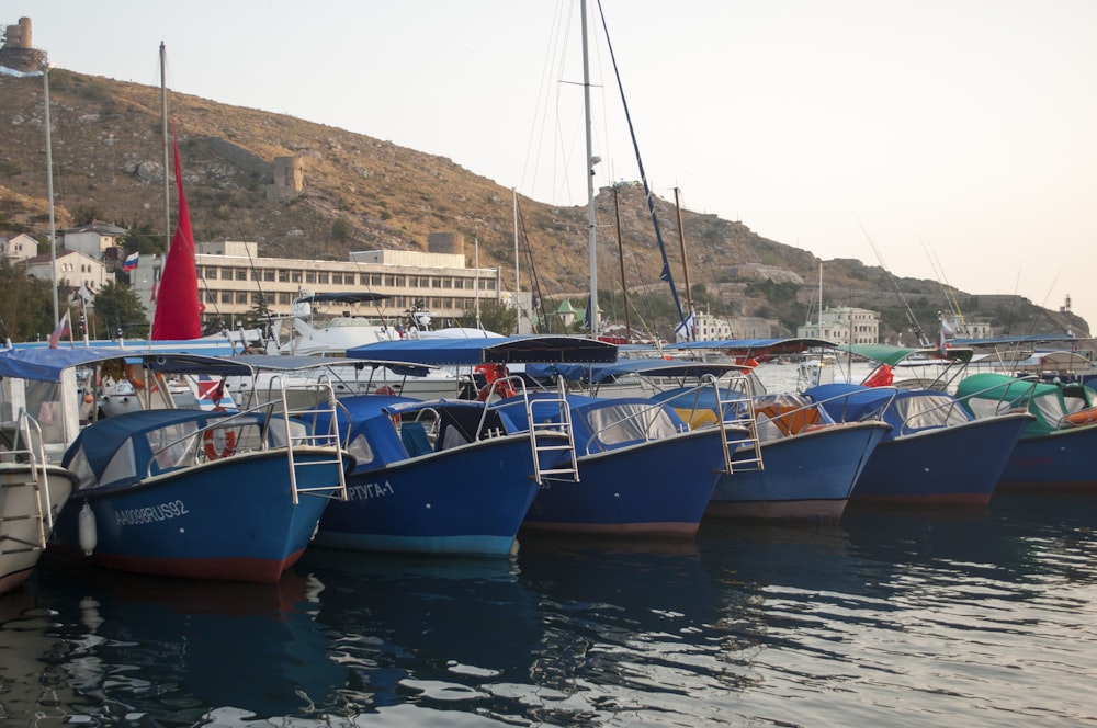 a bunch of boats that are sitting in the water