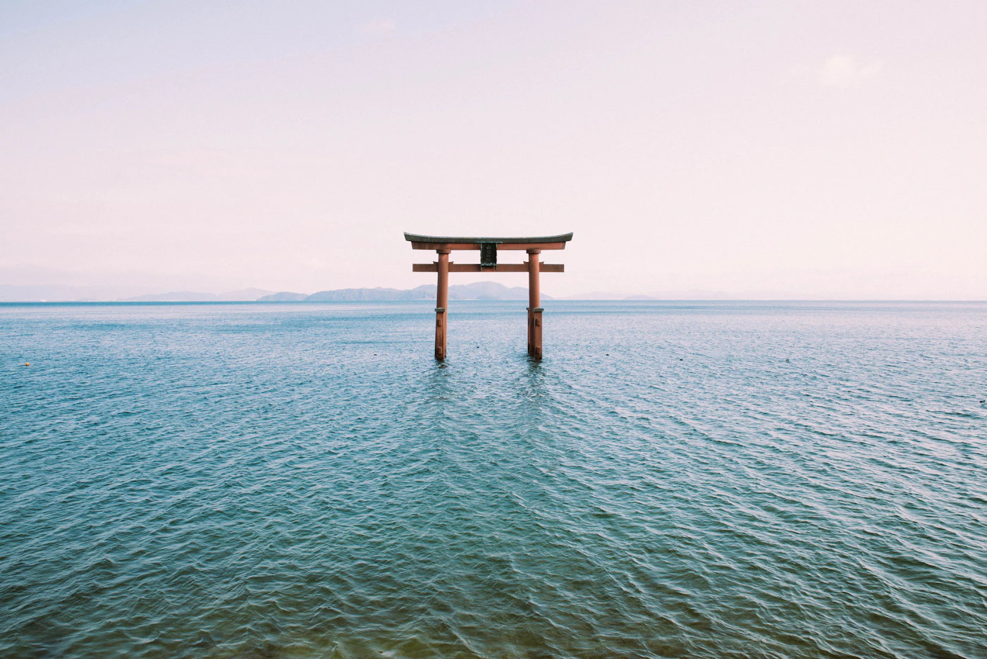 Torii gate standing in the water at Lake Biwa, Shiga
