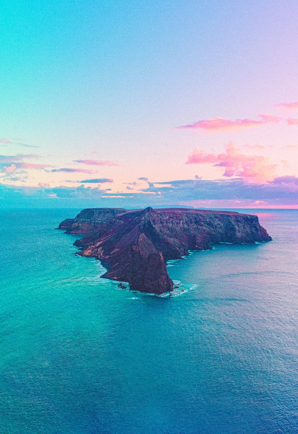 a large body of water surrounded by mountains