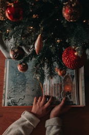 Festive illustrated children's book open on a wooden table