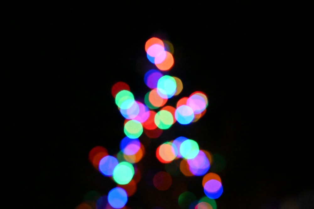 a blurry photo of a lit up christmas tree