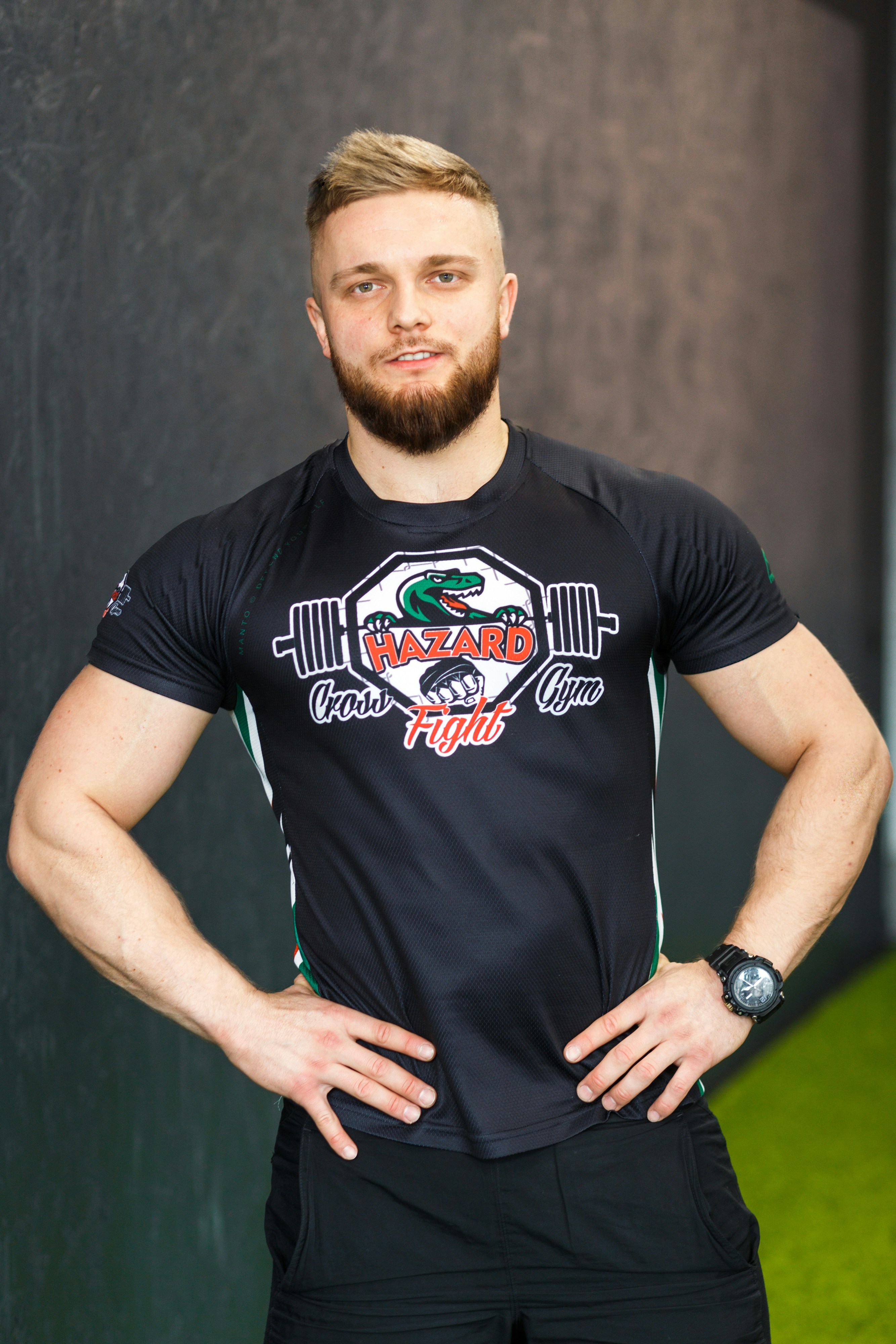 A man standing with his hands on his hips photo – Free Clothing Image ...