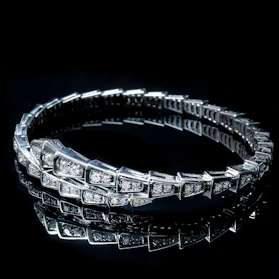 a diamond bracelet on a black background