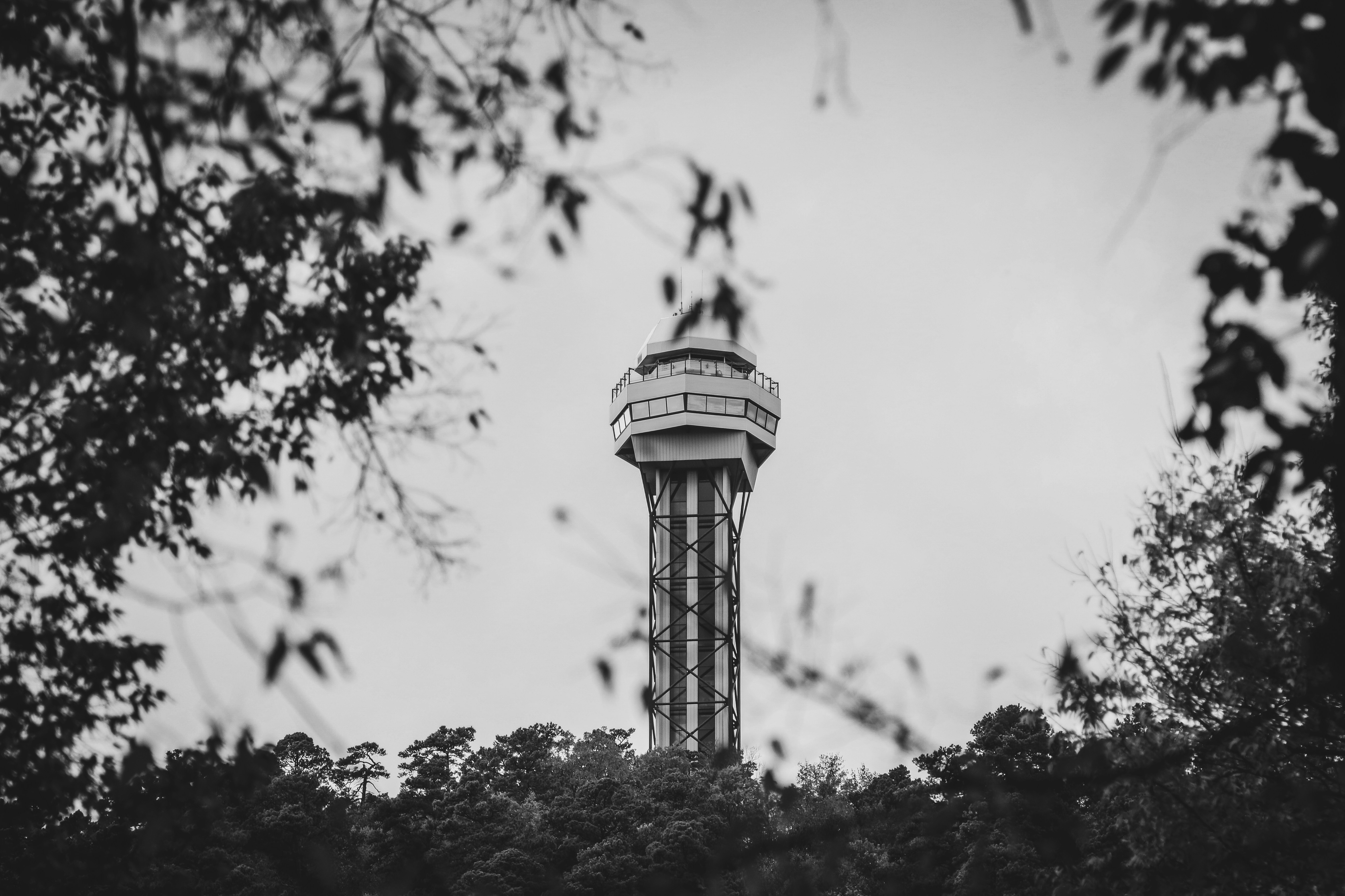 a black and white photo of a water tower
