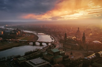 an aerial view of a city with a river running through it