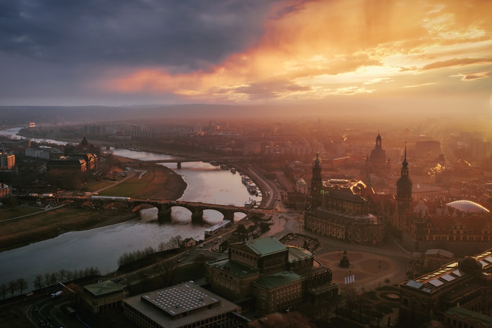 an aerial view of a city with a river running through it