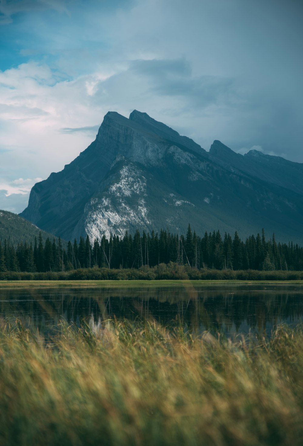 a mountain with a lake in front of it