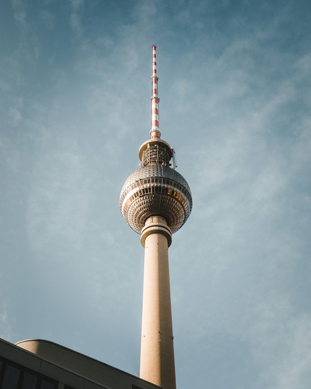 a tall tower with a sky background