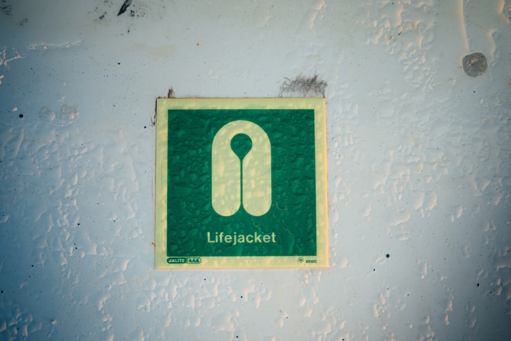 a lifejacket sign on the side of a building