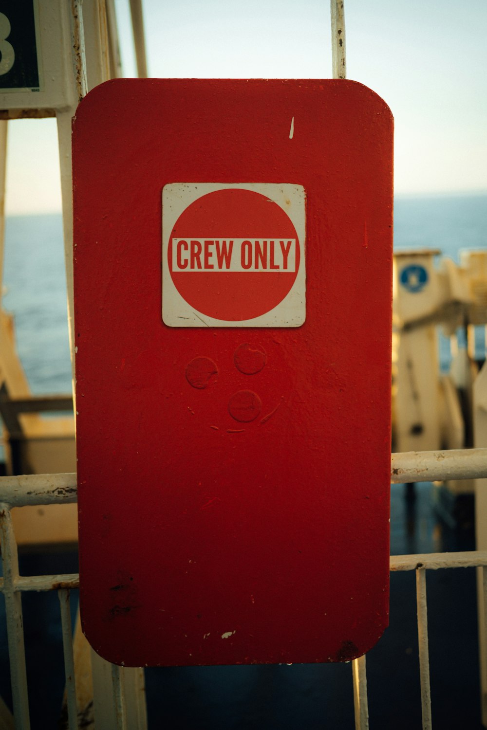 a red box with a sticker that says crew only