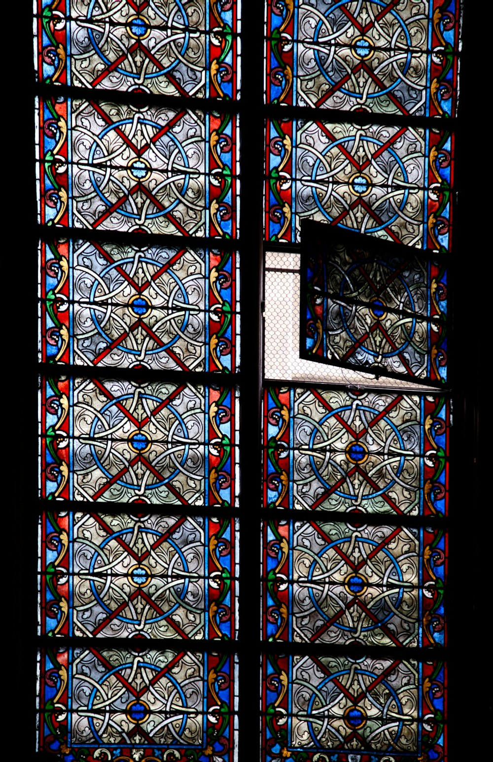 a stained glass window in a building