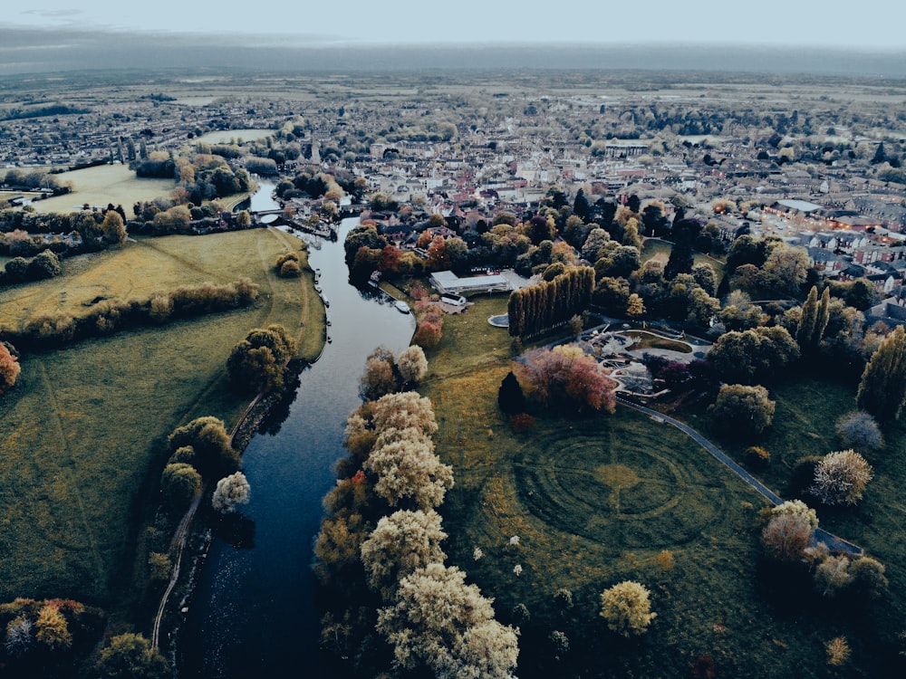 an aerial view of a city with a river running through it