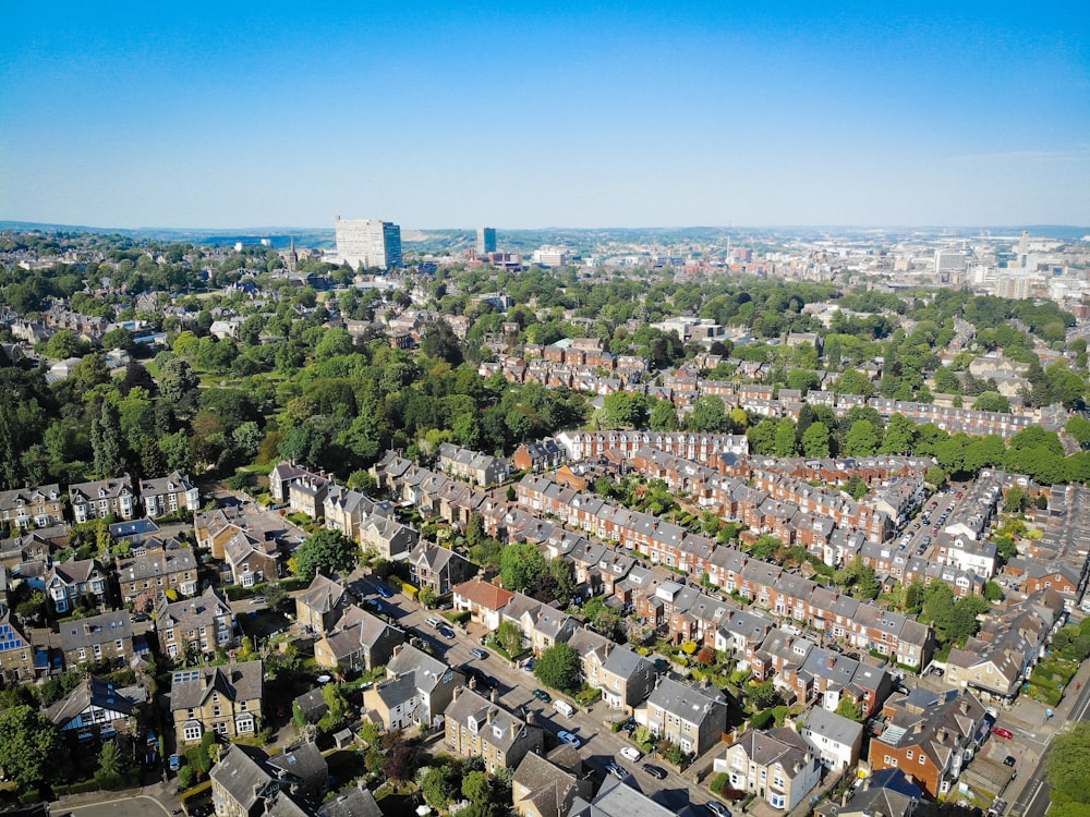 an aerial view of a city with lots of houses