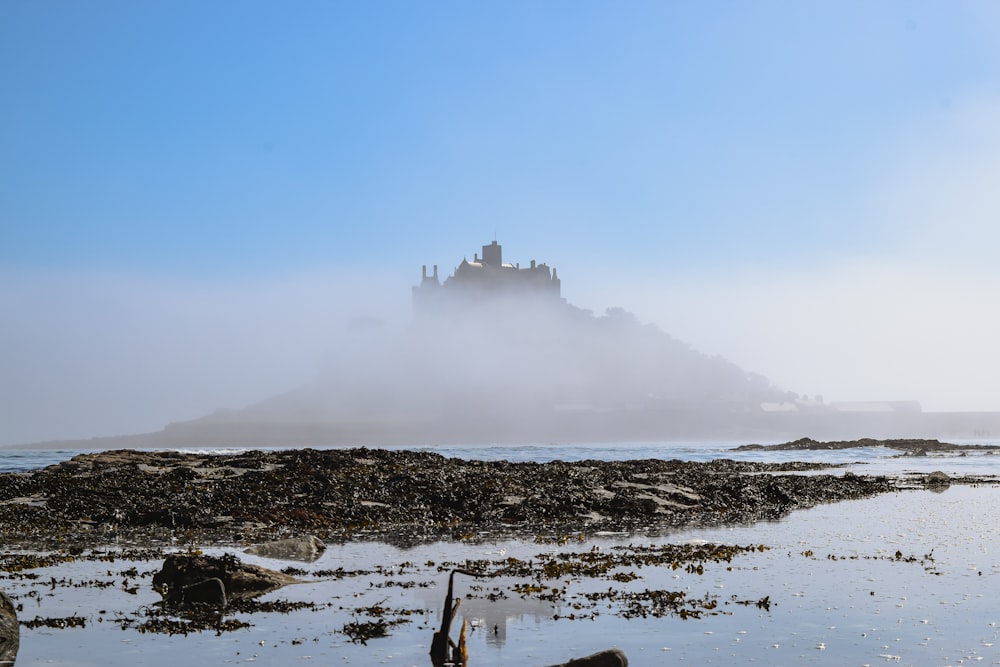 a castle in the middle of a body of water