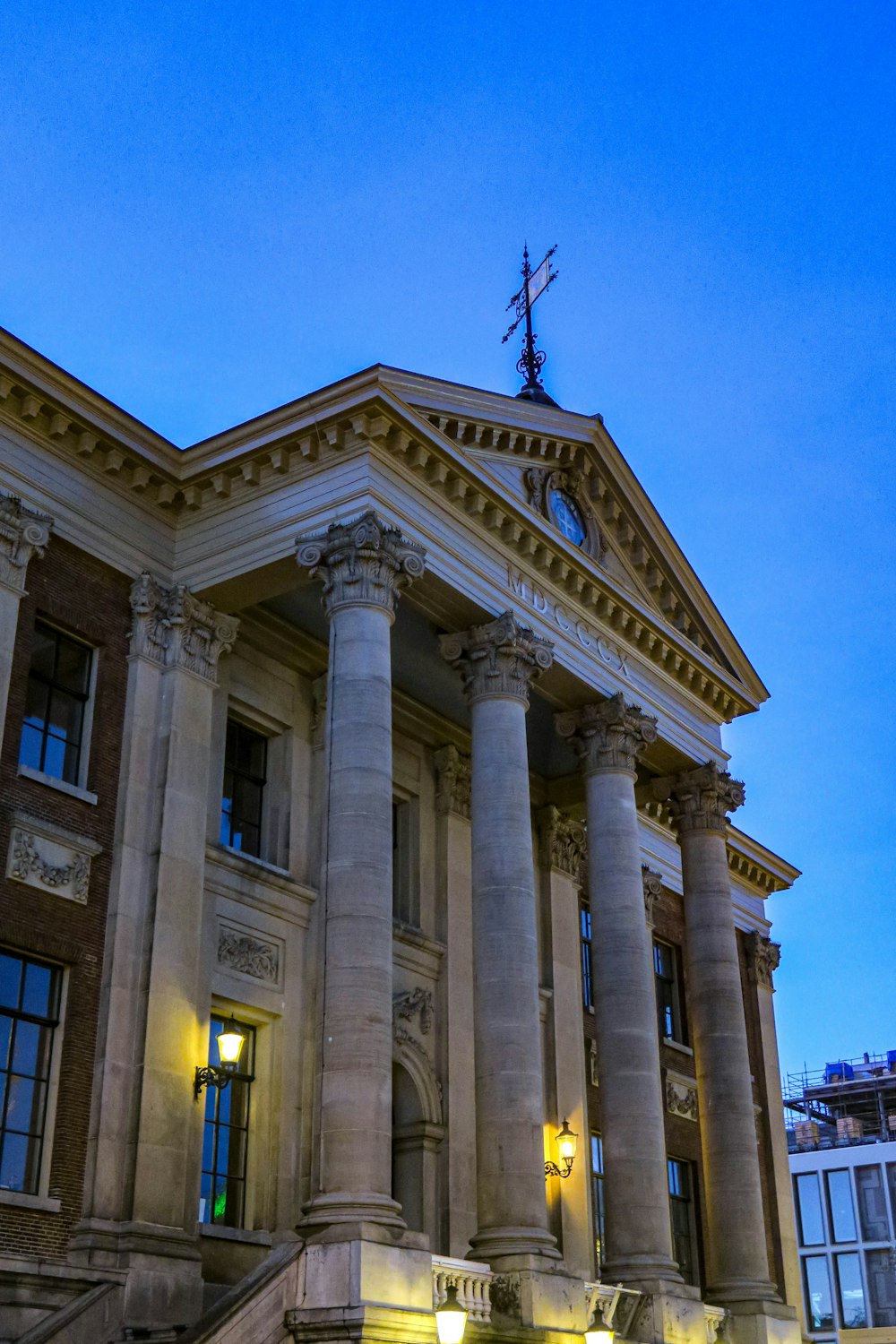 a large building with a clock on the top of it