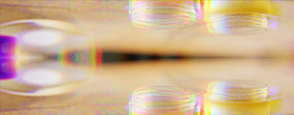 a blurry photo of a table top with soap bubbles