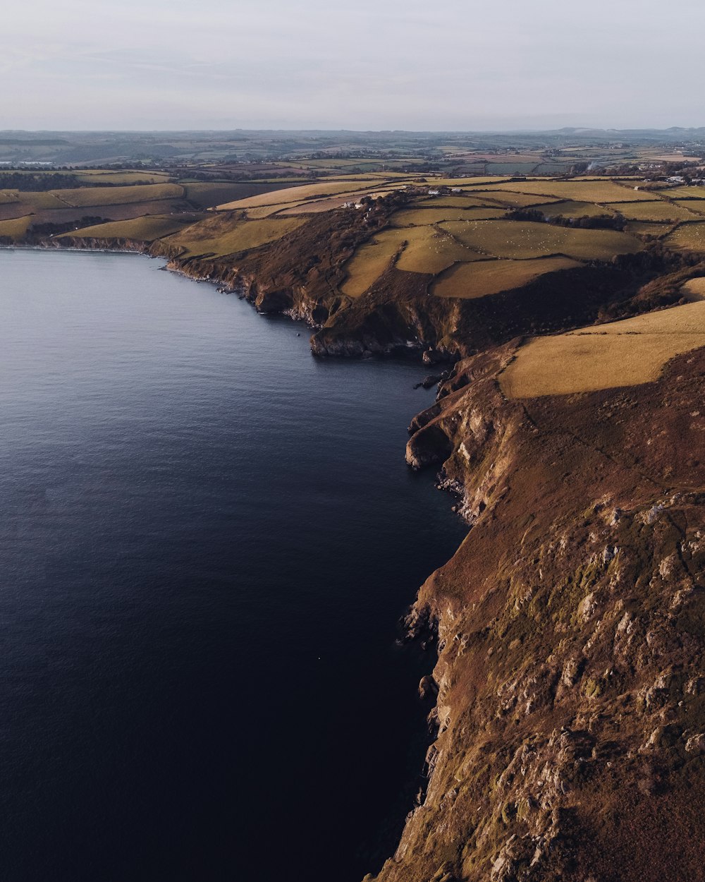 a large body of water surrounded by land