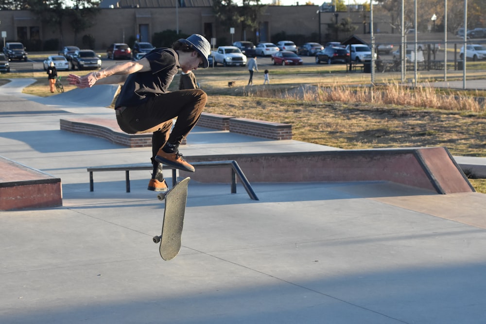 a man flying through the air while riding a skateboard