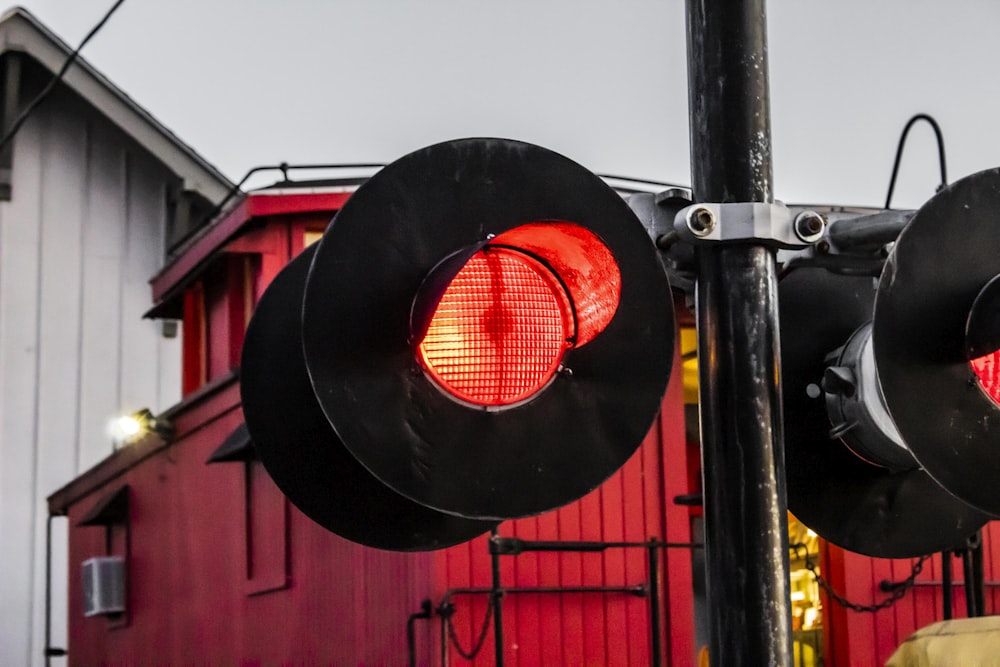 a couple of traffic lights hanging from a pole