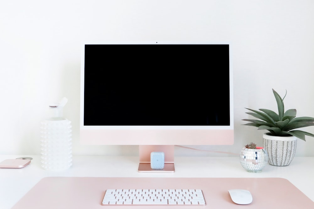 a desktop computer sitting on top of a desk