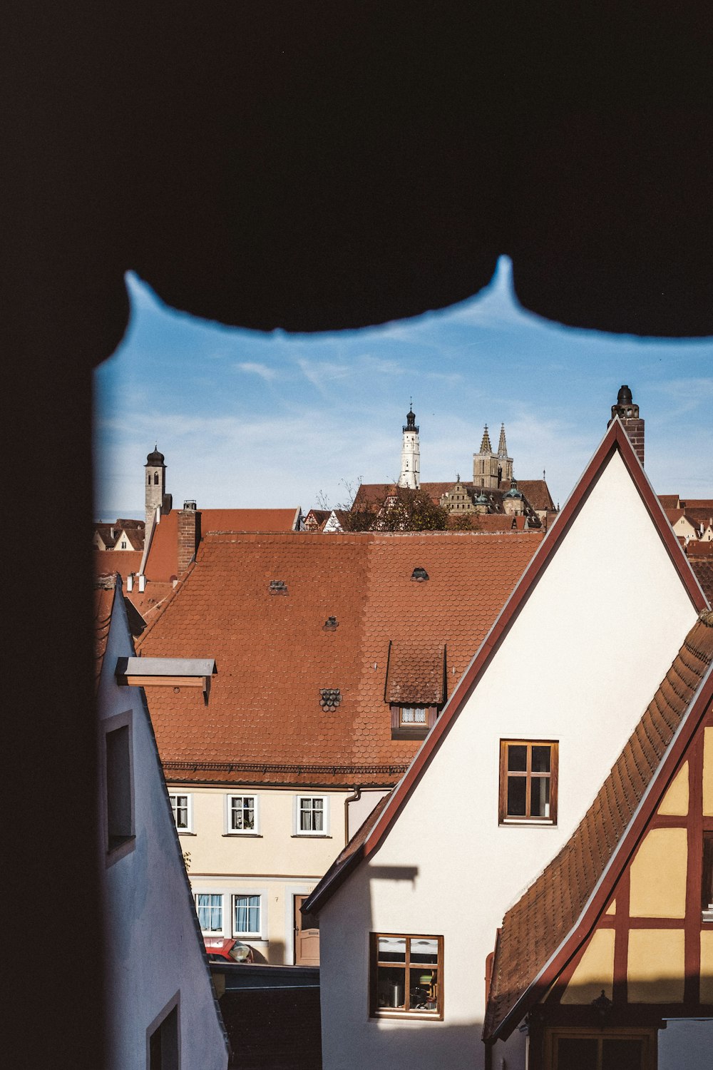 a view of some buildings from a window