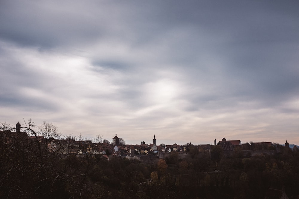 a view of a city from a hill