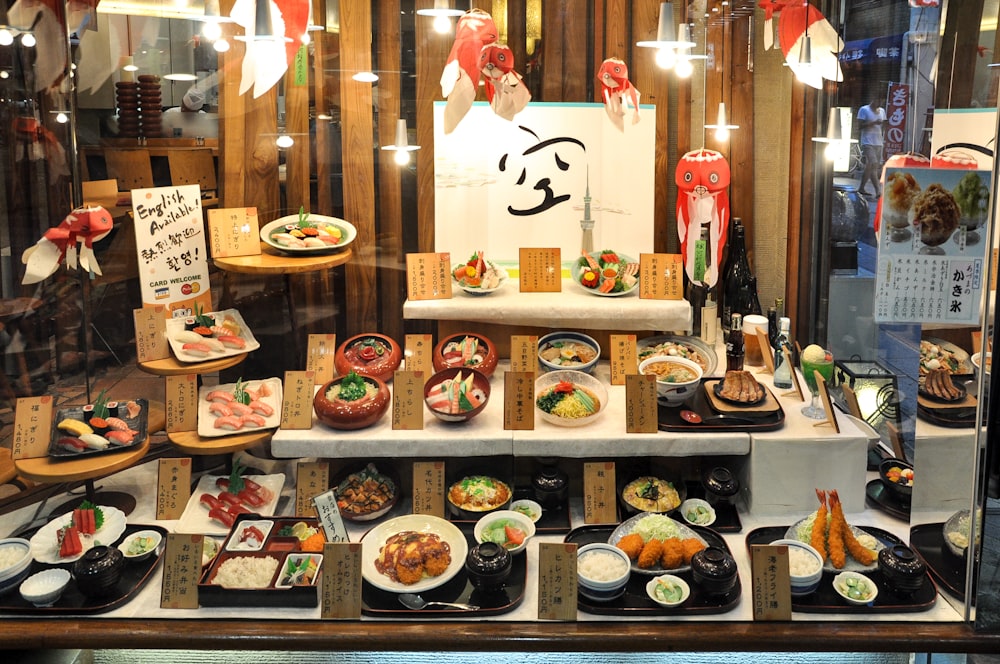 a display case filled with lots of different types of food