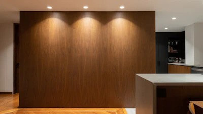 Modern luxury interior featuring multiple LED shelves casting a cozy warm light