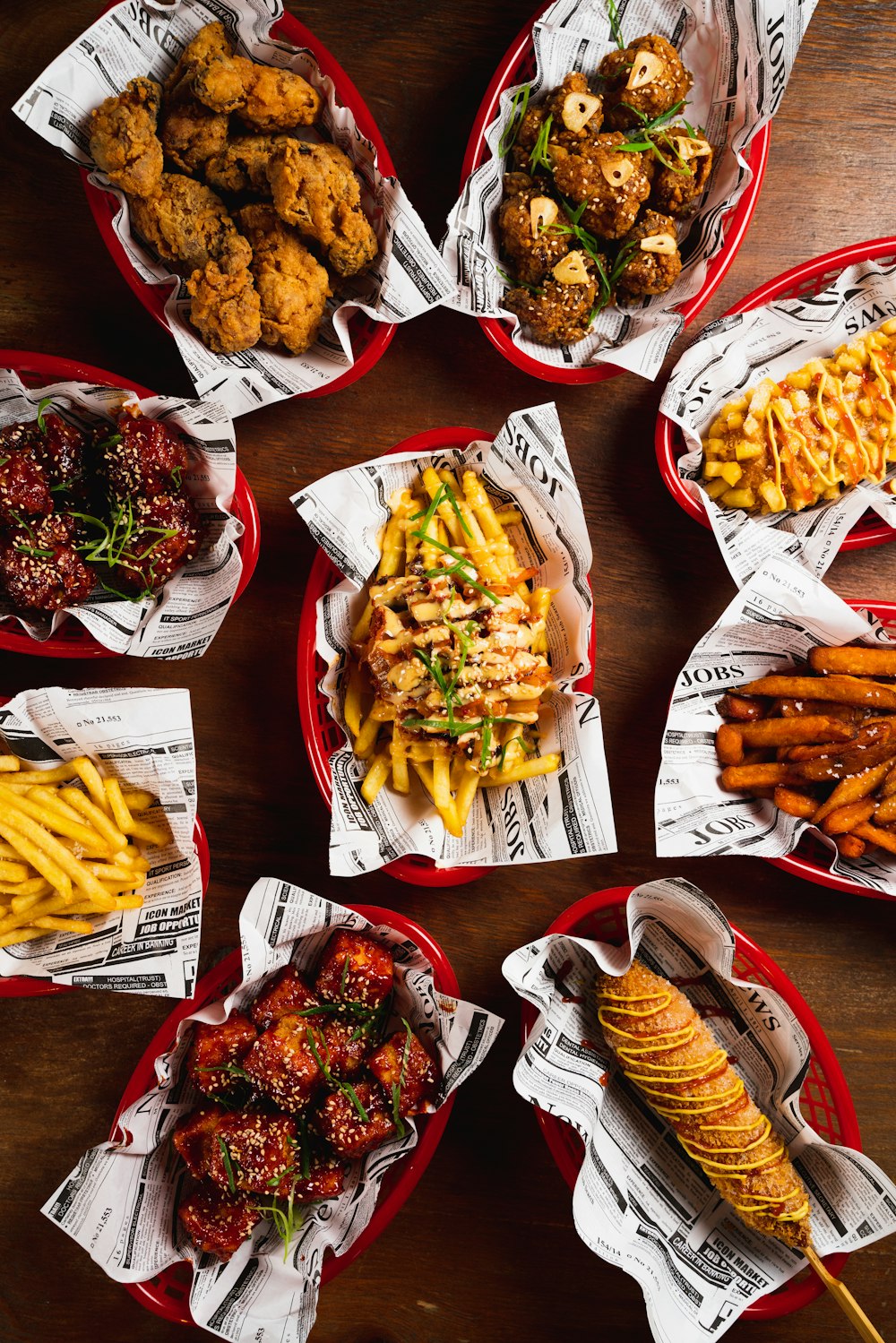 a table topped with baskets filled with different types of food