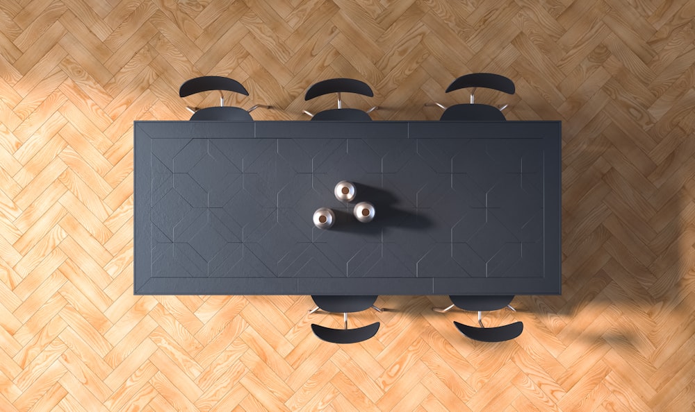 an overhead view of a table with three balls on it